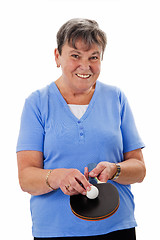 Image showing Senior woman playing pingpong
