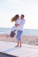 Image showing young couple  on beach have fun