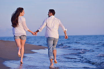 Image showing young couple  on beach have fun