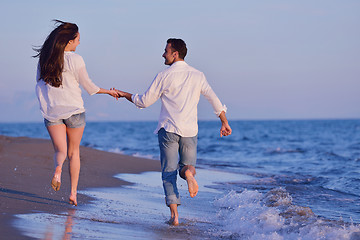 Image showing young couple  on beach have fun