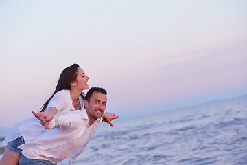 Image showing young couple  on beach have fun