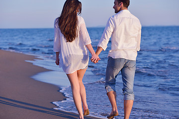 Image showing young couple  on beach have fun