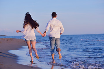 Image showing young couple  on beach have fun