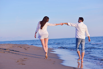 Image showing young couple  on beach have fun