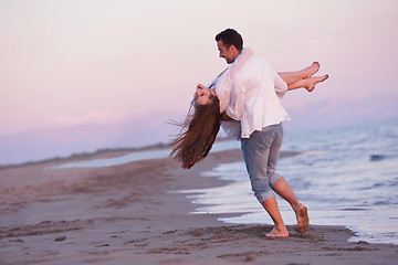 Image showing young couple  on beach have fun