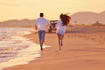 Image showing young couple  on beach have fun