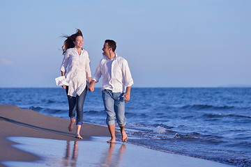 Image showing young couple  on beach have fun