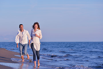 Image showing young couple  on beach have fun