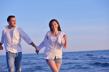 Image showing young couple  on beach have fun