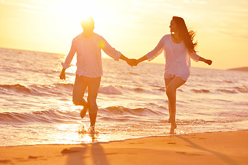 Image showing young couple  on beach have fun