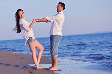 Image showing young couple  on beach have fun