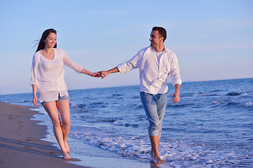 Image showing young couple  on beach have fun