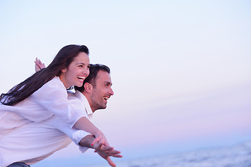 Image showing young couple  on beach have fun