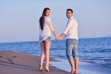 Image showing young couple  on beach have fun