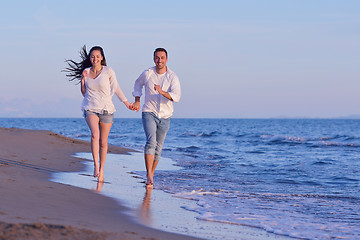 Image showing young couple  on beach have fun