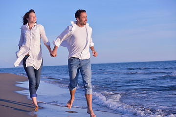 Image showing young couple  on beach have fun