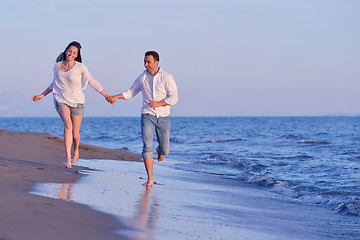 Image showing young couple  on beach have fun