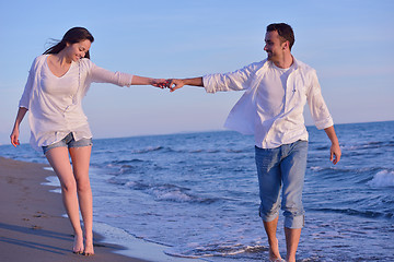 Image showing young couple  on beach have fun