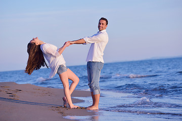 Image showing young couple  on beach have fun