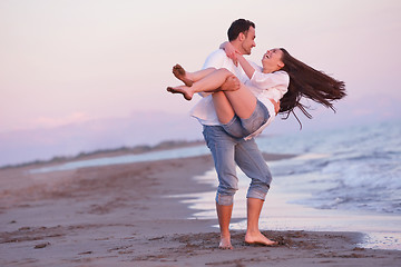 Image showing young couple  on beach have fun