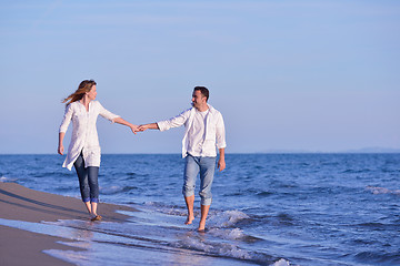 Image showing young couple  on beach have fun