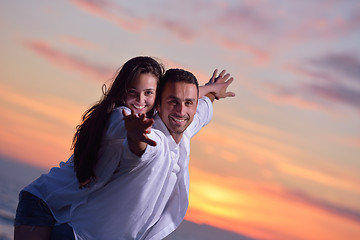 Image showing young couple  on beach have fun