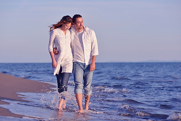 Image showing young couple  on beach have fun