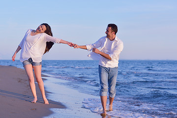 Image showing young couple  on beach have fun