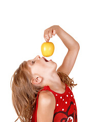 Image showing Girl eating an apple.