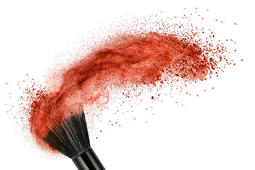 Image showing makeup brush with red powder isolated