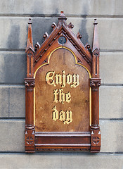 Image showing Decorative wooden sign - Enjoy the day