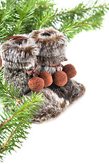 Image showing Winter boots with christmas tree