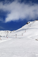 Image showing Chair-lift and ski slope