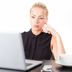 Image showing Business woman in office.