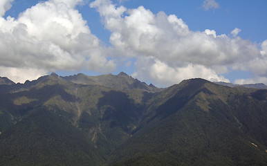 Image showing Caucasus mountains in a bright cloudy day