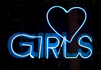 Image showing Girls in blue neon