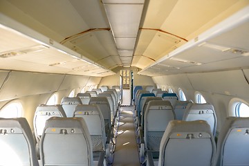 Image showing Interior of an airplane with many seats