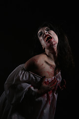 Image showing Psychotic Bleeding Woman in a Horror Themed Image