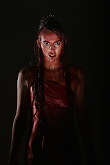 Image showing Psychotic Bleeding Woman in a Horror Themed Image