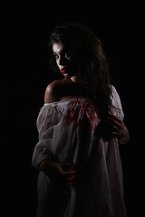 Image showing Psychotic Bleeding Woman in a Horror Themed Image