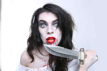 Image showing Psychotic Bleeding Woman in a Horror Themed Image