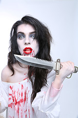 Image showing Psychotic Bleeding Woman in a Horror Themed Image