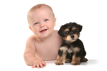 Image showing Adorable Baby Boy With His Pet Teacup Yorkie Puppy