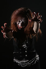 Image showing Psychotic Bleeding Woman in a Horror Themed Image