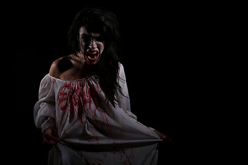 Image showing Psychotic Bleeding Woman in a Horror Themed Image