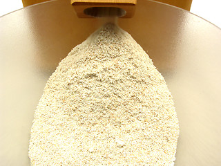 Image showing Looking at a flour mill doing its work