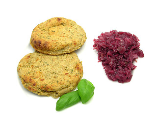 Image showing Round flat potato dough cakes with basil and red cabbage