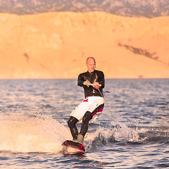 Image showing Wakeboarder in sunset.