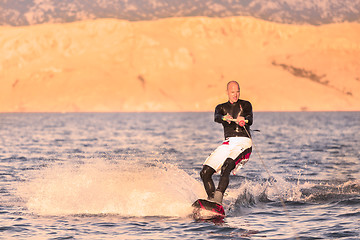 Image showing Wakeboarder in sunset.