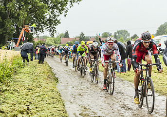 Image showing The Peloton on a Cobbled Road- Tour de France 2014